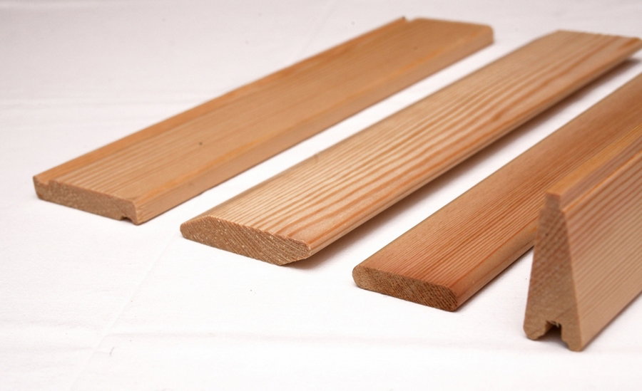 Coprifili, fermavetri e battiscopa in legno